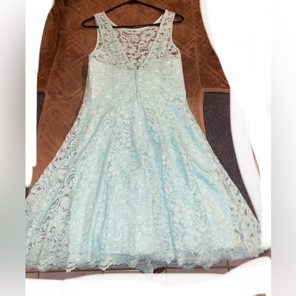 Knee length, teal lace (size 10)